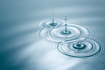 Three droplets on gentle waves